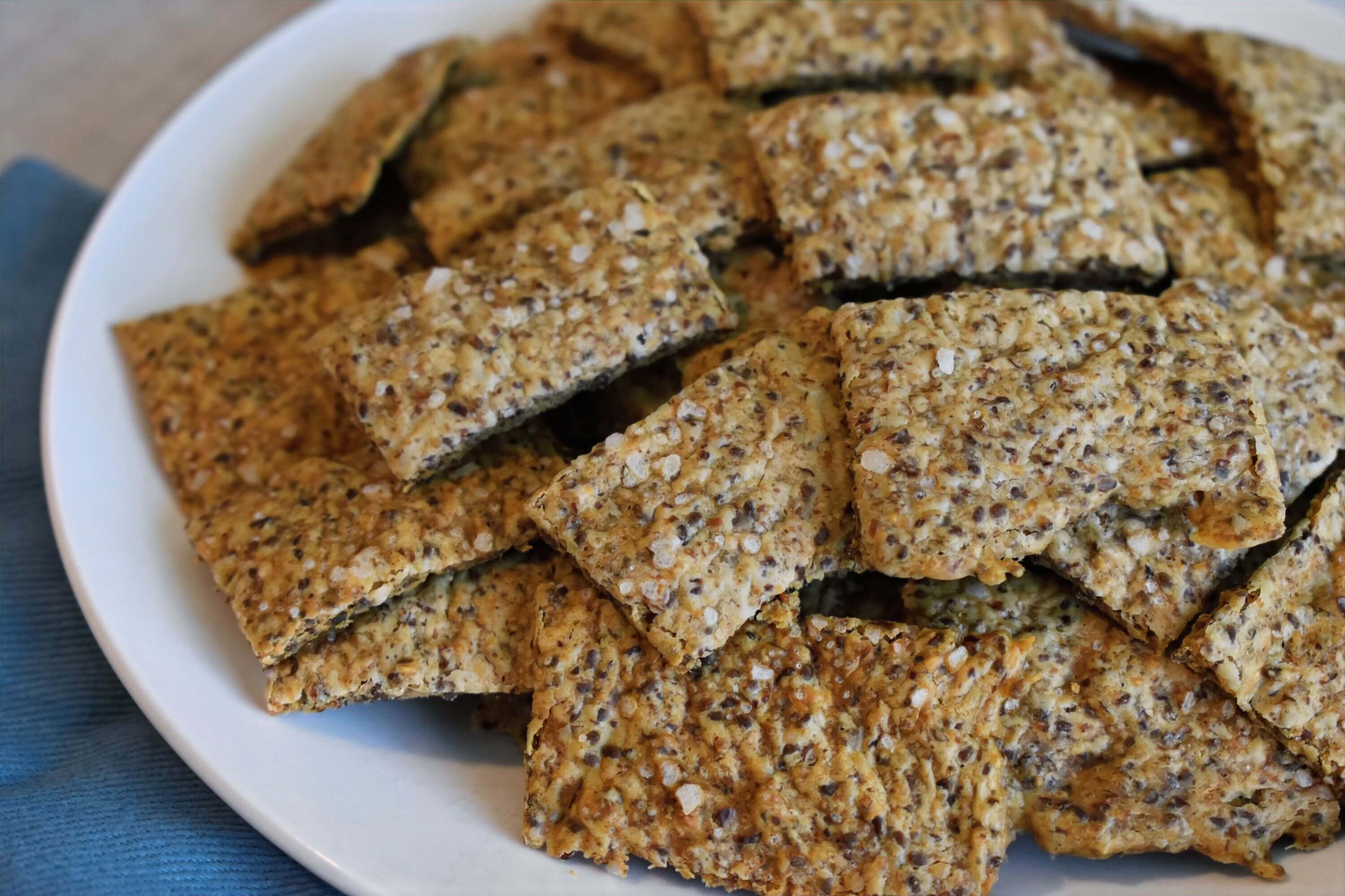 A plate of sourdough discard seed crackers